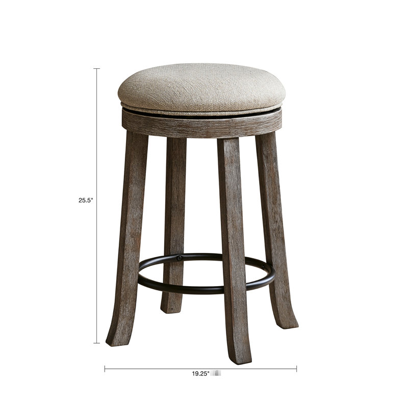 Tabouret rembourré texturé gris avec structure en bois légèrement patiné et fonction pivotante