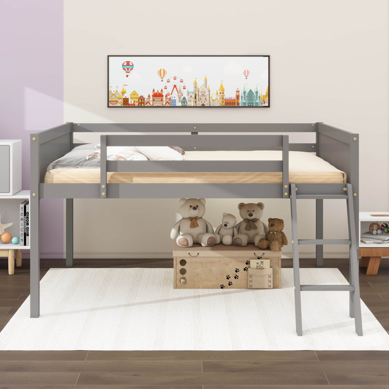 Un lit bas en bois double avec une échelle, gris