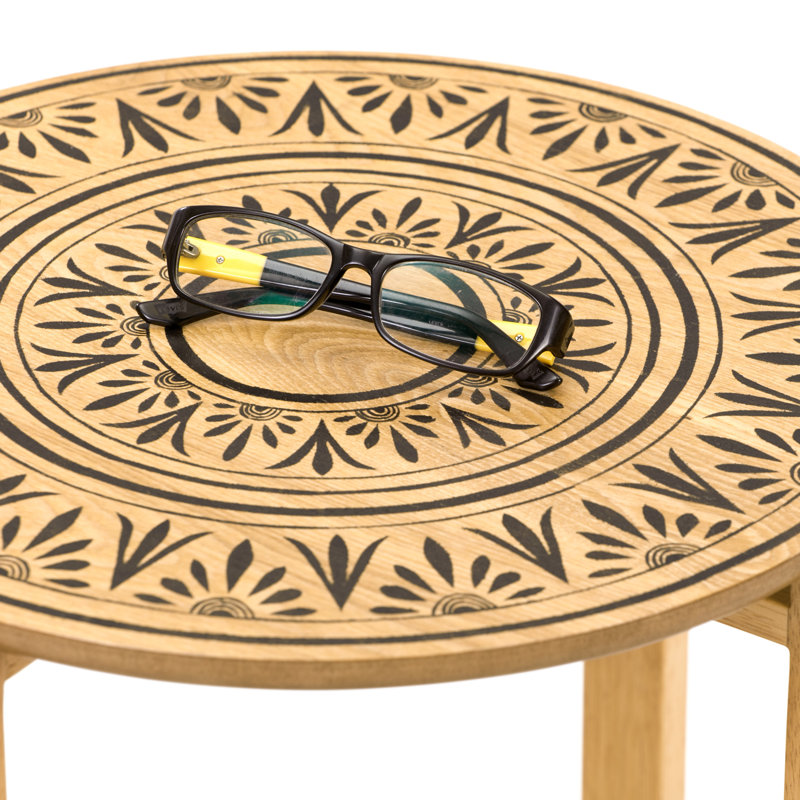 Natural Wood and Metal Round Coffee Table with Floral Design