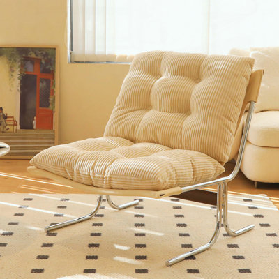 Chaise d'appoint moderne avec structure en métal, siège surdimensionné et dossier à oreilles