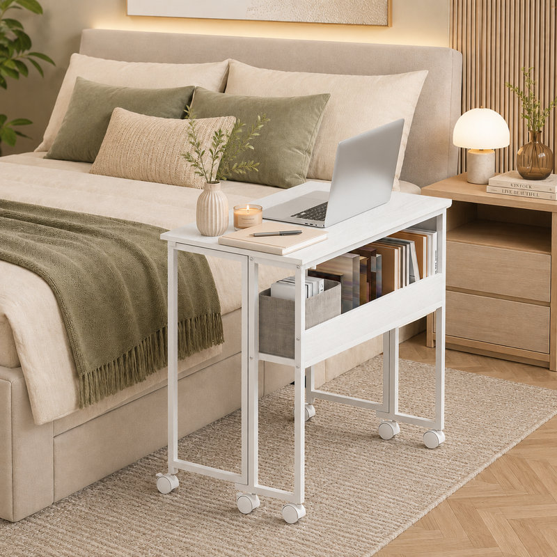 Bureau d'ordinateur pliant blanc portable avec pochette de rangement et tablette; un bureau roulant conçu pour les bureaux à domicile dans des espaces de vie compacts.