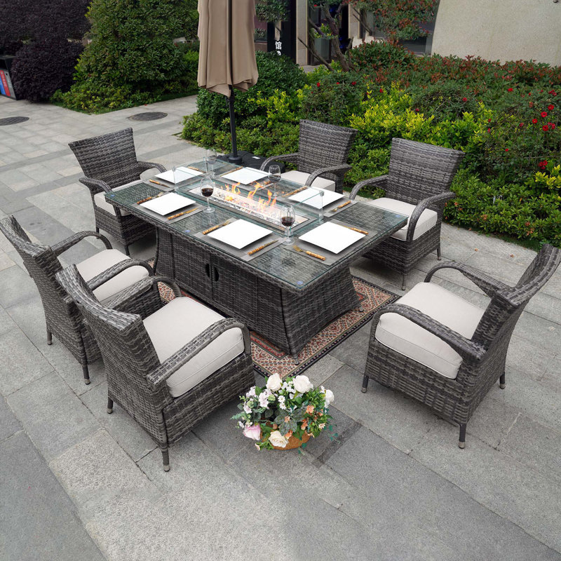 Ardala 6 - Person Wicker Patio Dining Set with Rectangular Table , Cushions Included, Gray