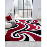 Tapis rouge / noir à motif abstrait Calista