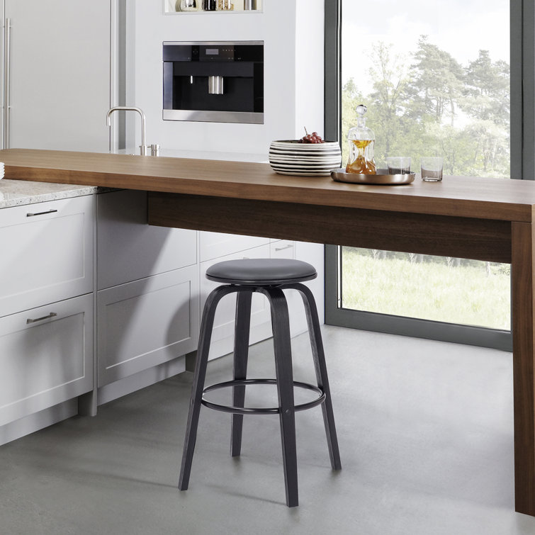 Zeno Mid-Century Modern Swivel Counter or Bar Height Backless Bar Stool in Faux Leather, Wood