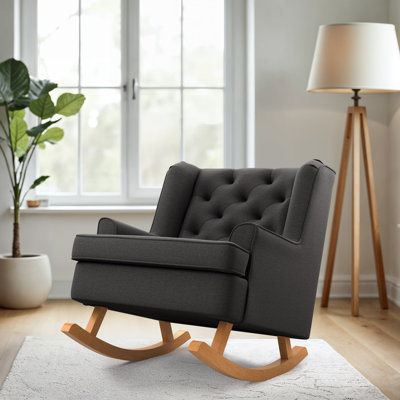 Chaise berçante capitonnée en tissu