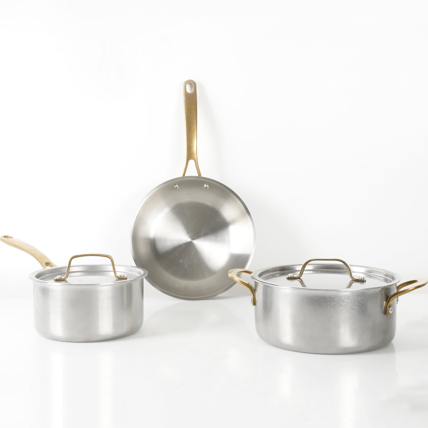 https://assets.wfcdn.com/im/85787823/compr-r85/2224/222411278/martha-stewart-5-piece-stainless-steel-cookware-set-with-brass-handles.jpg