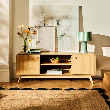 A brown and white TV stand with shelves and drawers.