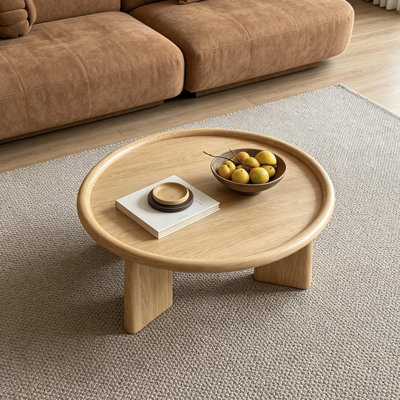 Table basse ronde en bois pour petit appartement