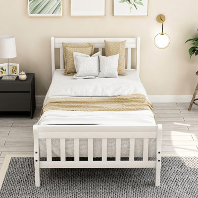 Cadre de lit simple blanc avec support en lattes de bois, en bois massif et stable, idéal pour la tête de lit de la chambre d'amis