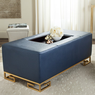 Chalandra 46" Wide Faux Leather Rectangle Cocktail Ottoman with Storage