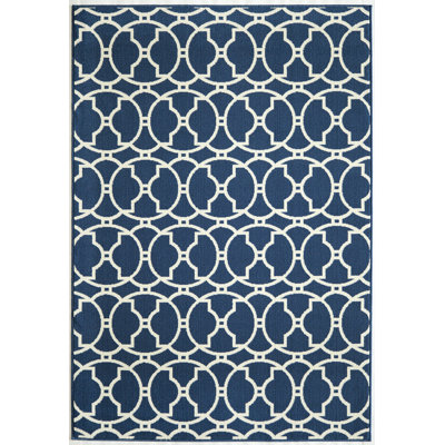 Tapis intérieur / extérieur à motif géométrique bleu Yepez
