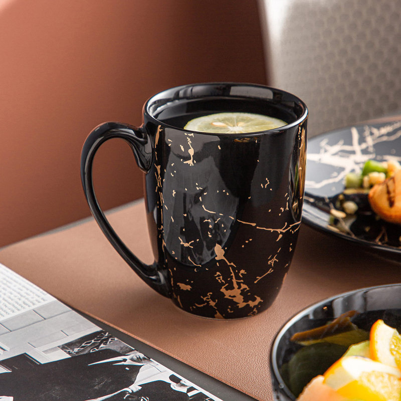 Black and Gold Splash Porcelain 16-Piece Dinnerware Set