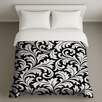 Housses de couette damassées noires et blanches