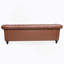 Canapé Chesterfield en polyuréthane à accoudoirs roulés.-114427252
