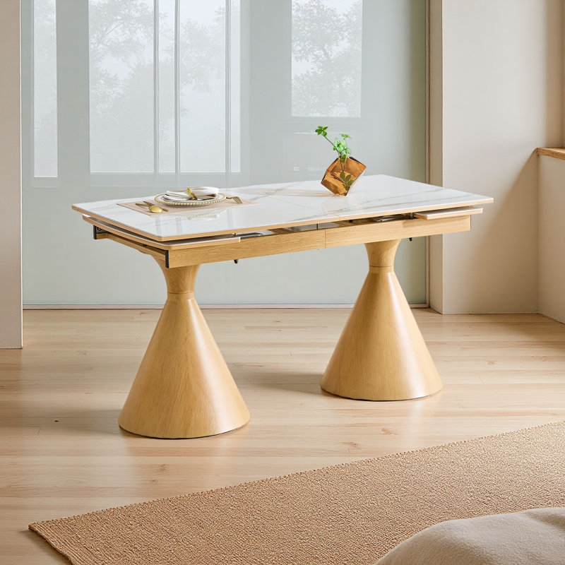 Extendable Stone-Top Dining Table: marble-patterned tabletop with tapered metal legs. A modern, luxury-inspired rectangular dining table for home use