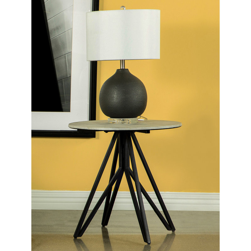 Table de bout ronde en ciment et bronze industriel Hadi