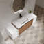 Meuble-lavabo mural avec lavabo à poser en résine, deux tablettes et portes à fermeture en douceur-1756216156