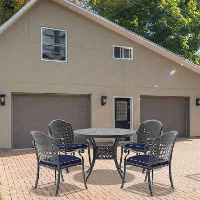 Ensemble de 5 meubles de patio en aluminium coulé avec cadre noir et coussins de siège bleus