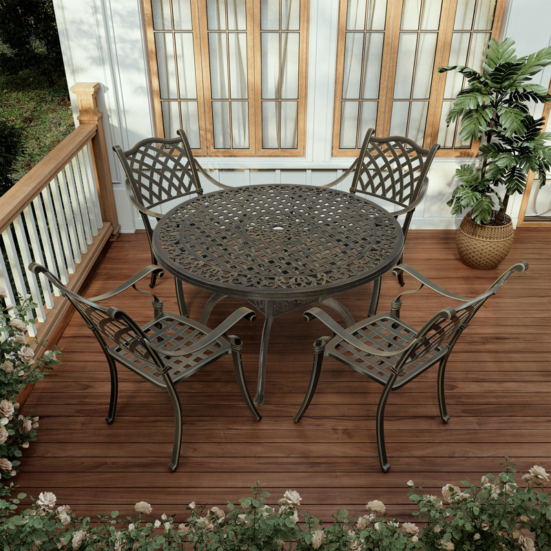 Tsavag 4 - Person Metal Patio Dining Set with Round Table, Brown