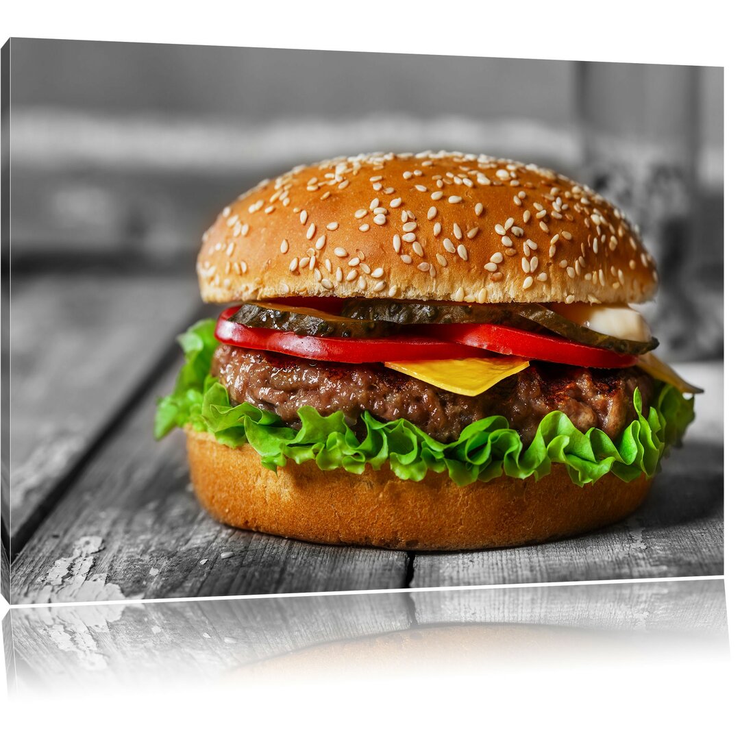 Leinwandbild Appetitlicher Cheeseburger