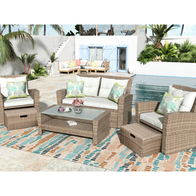 Ensemble de 4 chaises modulaires toutes saisons avec coussins et table basse d'extérieur en U Thrive Thrive