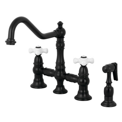 Kingston Brass Restoration Two-Handle 4-Hole Deck Mount Bridge Kitchen Faucet with Brass Side Sprayer