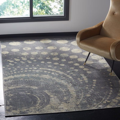 Tapis abstrait gris clair doré