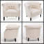 Élégant fauteuil club en tissu beige Akira avec dossier capitonné et accoudoirs cloutés-113569579