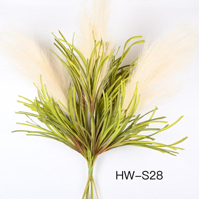 Arrangement de sprays de gazon artificiel