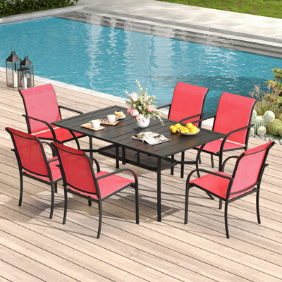Cihangir Rectangular 6 - Person 60'' L Outdoor Patio Dining Set with 6 Stackable Textilene Armrest Chairs