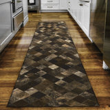 Avahlynn Patchwork Machine Woven Chenille Area Rug in Brown