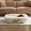Table basse moderne et artistique avec texture imitation travertin-194619259