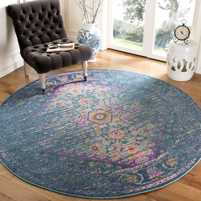Felty Floral Blue Area Rug