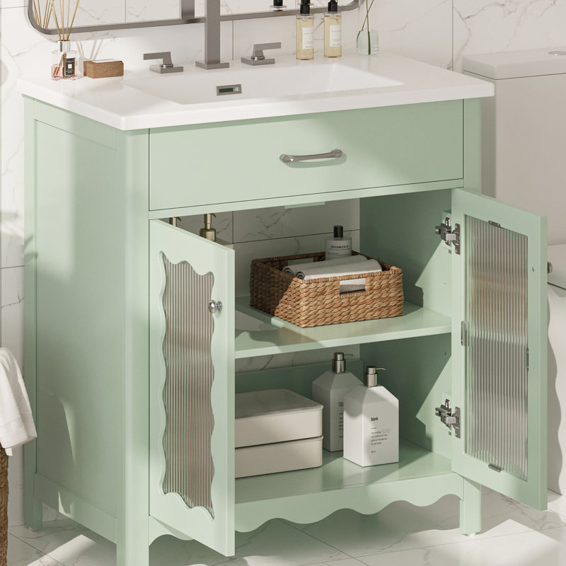 Meuble-lavabo de salle de bain de 79 cm (31 po) avec portes en verre à rayures verticales, étagères réglables, charnières à fermeture douce et résistance aux égratignures et aux taches pour un lavabo rectangulaire en céramique facile d'entretien et bien organisé.