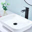 Robinet de lavabo de salle de bain à poignée simple avec bec cascade-115827464