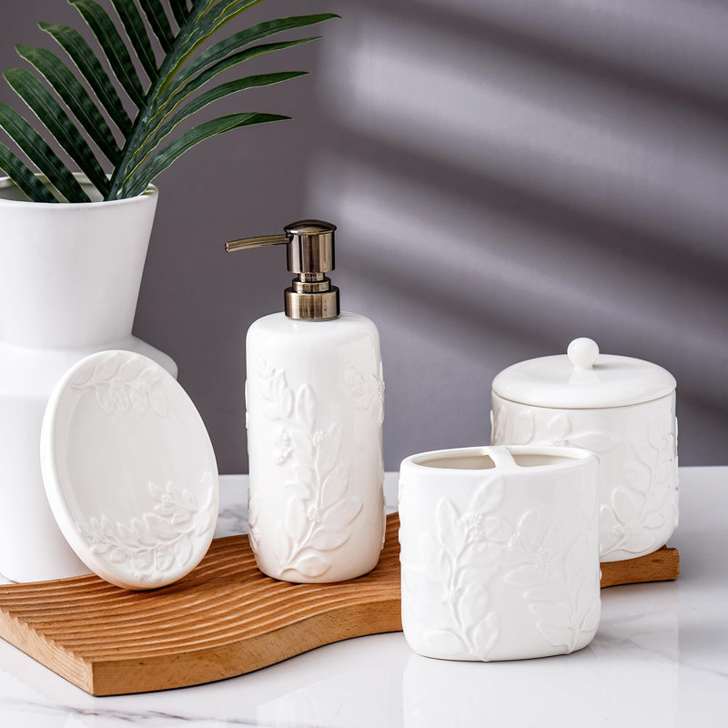 Ensemble d'accessoires de salle de bain, ensemble complet d'accessoires de salle de bain en céramique 4 pièces avec distributeur de lotion à motif de feuilles 3D, pot en coton, porte-savon, gobelet (blanc)