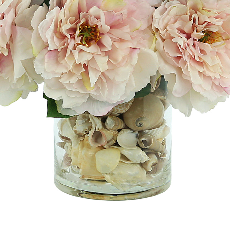 Peony and Hydrangea Arrangement in a Clear Glass Pot with Seashell