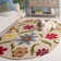 Emrick Hand Hooked Wool Floral Rug