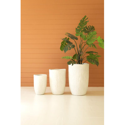 SET OF THREE STONE COMPOSITE PLANTERS