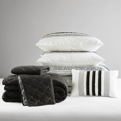 King/ King 7 Piece Comforter And Quilt . Crafted From Microfiber. Provides Outstanding Comfort. Soft Fluffy. Stripe Pattern. Adapts To Different Bedroom Decor. Wrinkle Shrinkage . Easy Upkeep - King.