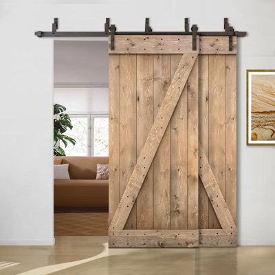 Porte de grange à panneaux et en bois avec quincaillerie d'installation