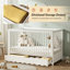 Lit de bébé avec pieds en bois massif avec rangement Aiago -335044180