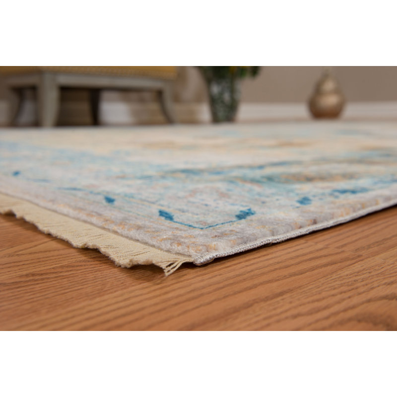 Tapis turquoise Efaz, Rectangle 2 pi 7 po x 4 pi 3 po