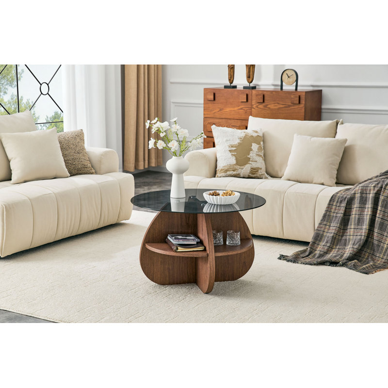Table basse à structure croisée Creative avec plateau en verre trempé gris et rangement en forme d'éventail de couleur noyer. Parfait pour les salons, comme table basse ou table d'appoint. Idéal pour les petits espaces.