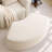 Hackworth Upholstered Fabric Rounded Curved Ottoman