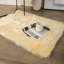 Tapis jaune à poils longs Haja-98175769