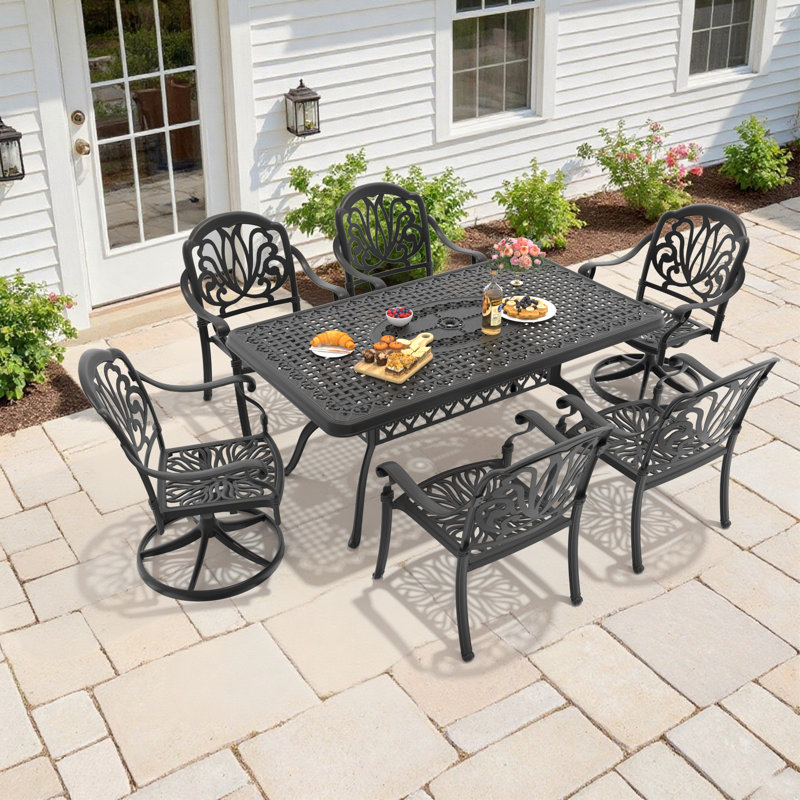 Ensemble repas pour 6 personnes rectangulaire en fonte d'aluminium avec 2 chaises pivotantes et coussins bruns