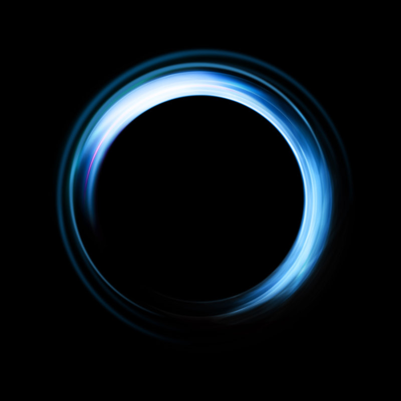 Abstract Background Of Ring Light With Luminous Swirling On Black by Milante - Wrapped Canvas Print