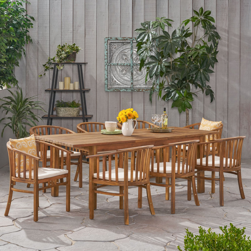 Aracely 8 - Person Acacia Wood Patio Dining Set with Extendable Rectangular Table , Cushions Included