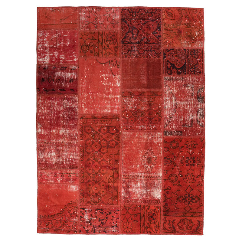 Tapis rouge en laine noué à la main
